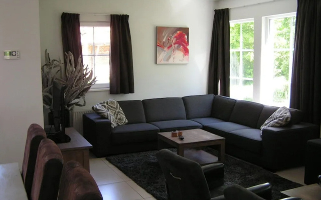 Spacious 10-person Villa in Quiet Holiday Park