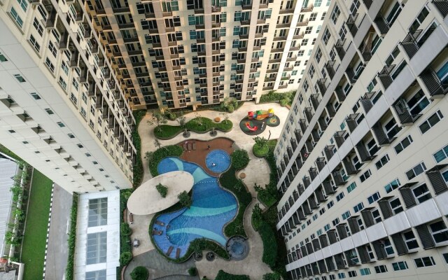 Cozy 1BR at Puri Orchard Apartment