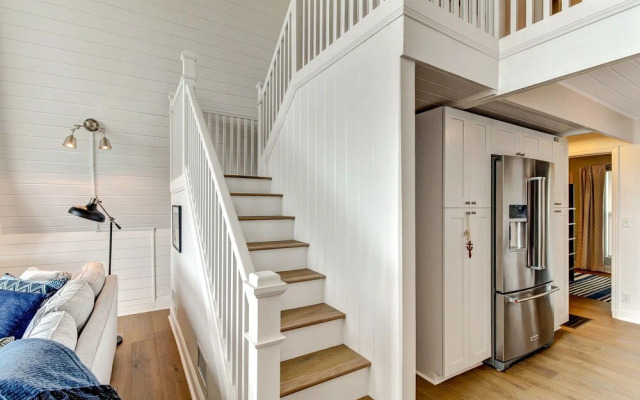 Roomy Chalet-Style Beachfront Condo with Private Beach Access by RedAwning