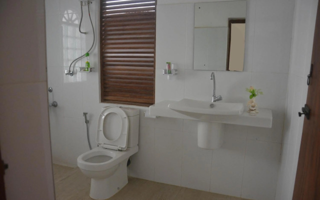 Green White Deluxe Room