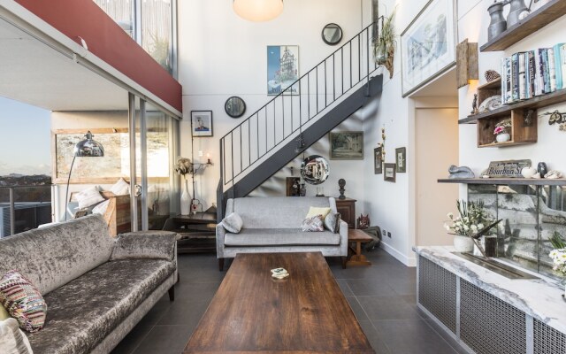 Loft Penthouse With Startling City Views + Parking