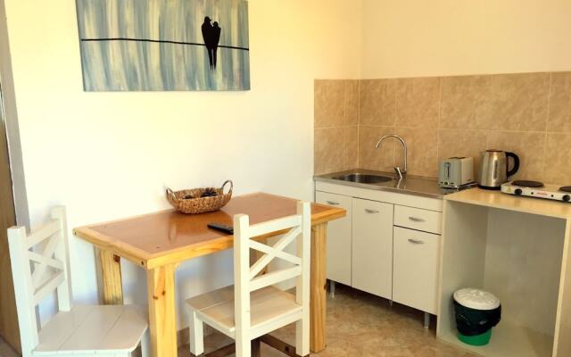 Apart Hotel el Jardin de los Presentes