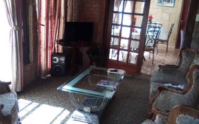 Afro-She Guest Lodge