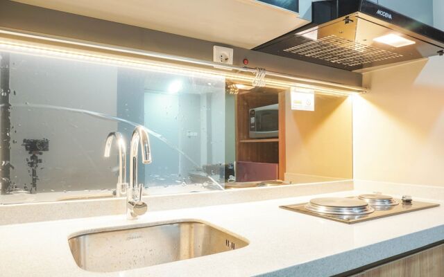 Elegant 1BR Apartment with Working Space Mustika Golf Residence