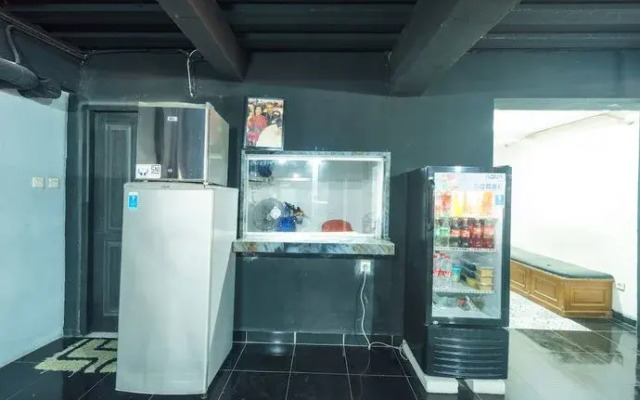 OYO 93133 Hotel Moraja Near Stikes Abdi Nusantara