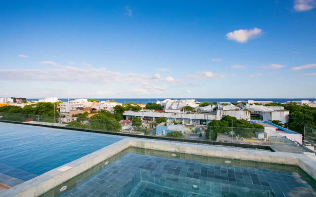 Kaab by the Beach. Condo with roofpool
