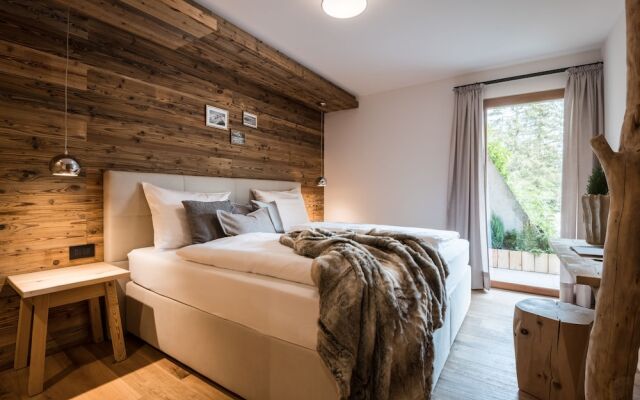 Les Dolomites Mountain Lodges