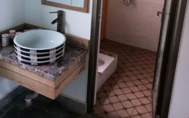 Dali Shuanglang Suiyuanju Inn