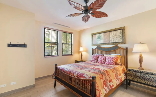 Luxe! Impressively designed 2nd-floor unit in Coco done in red and orange hues