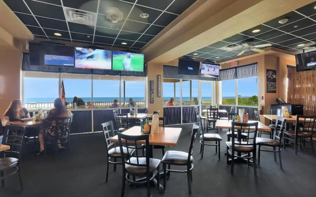 Unmatched Beachfront Condo With Roomy Balcony and Pool