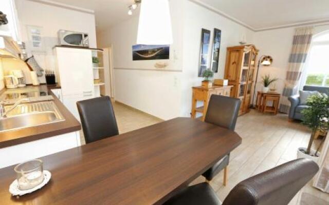 Kurparkresidenz Baabe - Ferienwohnung Meeresgarten mit Terrasse