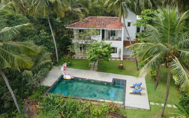 Frangipani by Hireavilla - 4BR w Pool Field View