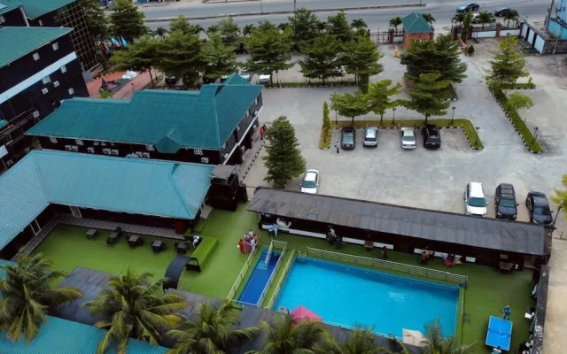 Brick Rock Hotel And Suites