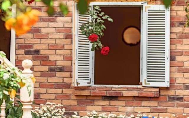 GUANXIN · Half a Mile | Monet Garden Inn Monet Garden