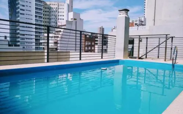 Madera Suite · Rosario centro y costanera