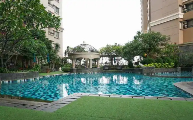 Sweet 2BR Mediterania Marina Residences By Travelio