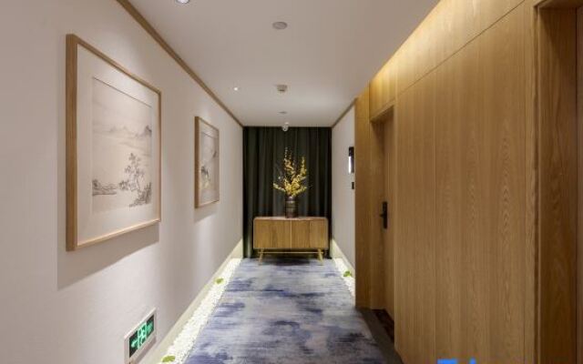 QIANNA HOTEL (Xinxiang Hualan Avenue Pangdonglai Shopping Plaza)