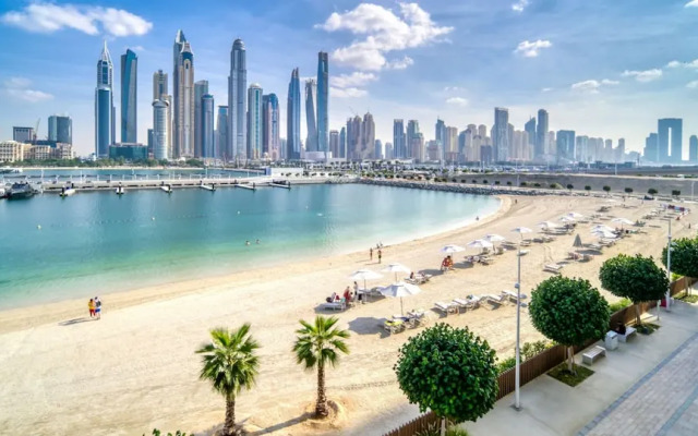 Elegant 2BR Emaar Beachfront Retreat