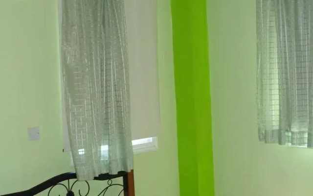 Melpo Court
