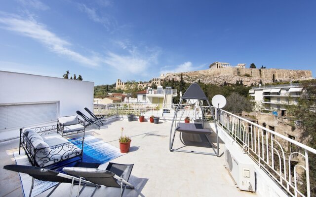 Your Home under the Acropolis Roofdeck