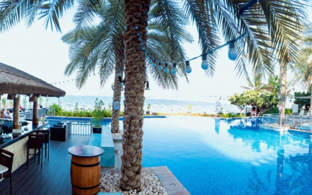 Shoreline Beachfront Luxury Palm