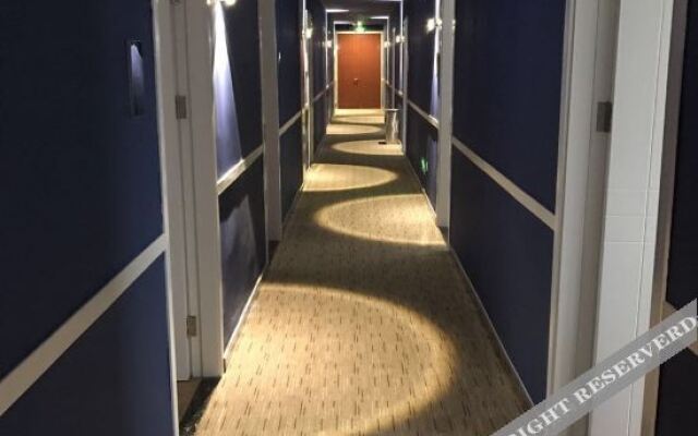 Changee Hotel MINI (Shanghai Zhoupu Fanrong Road Subway Station)