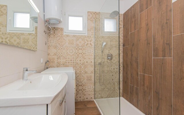 Awesome Home in Jezera with Hot Tub, WiFi & 1 Bedrooms