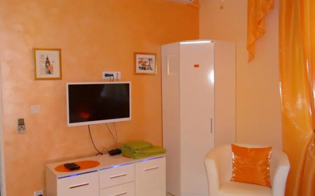 Orange Flower Apartments 1