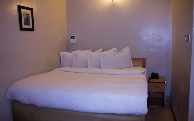 Triple Tee Hotel