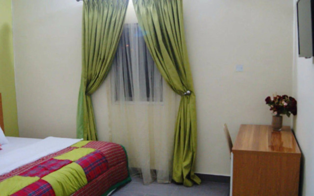 Purple Tulip Hotel