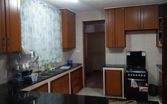 Esao Airport Suites