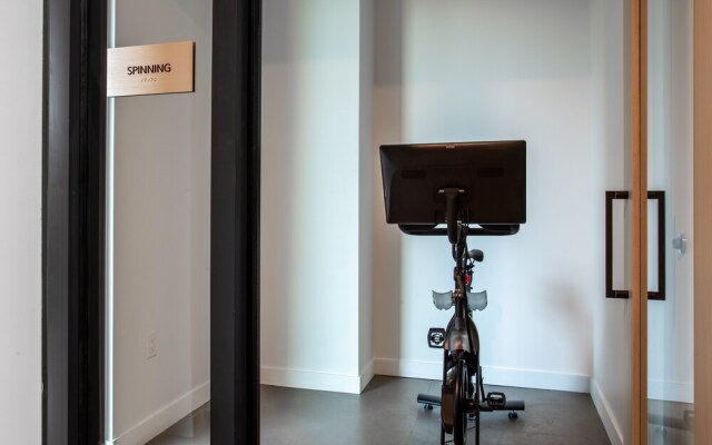 20th floor condo with pool on Rainey St by Locale