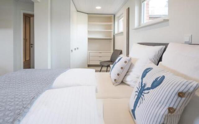 Bungalow Neuwarft, Wohnung 1