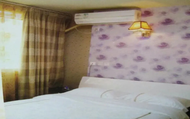 Beichuan Yijia Business Inn