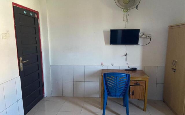 SPOT ON 91623 Pj Guest House Syariah