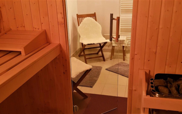 Mountain peaks Apartment with Sauna