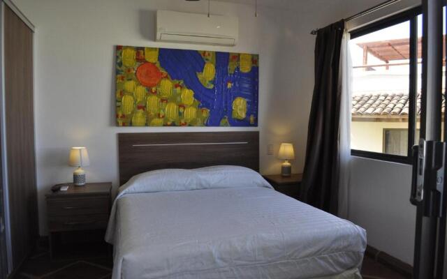 Tropical Gardens - Suites and Apartments