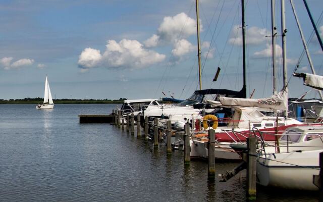 Cozy houseboat at the edge of the marina with beautiful view