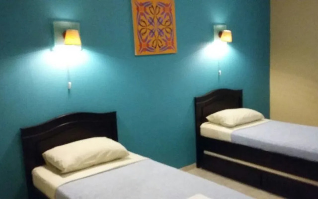 Capital O 1662 Ole Suites Hotel