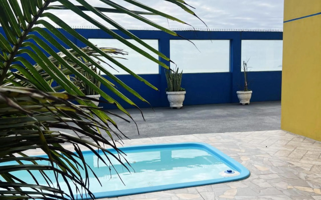 PÉ NA AREIA apartamento térreo