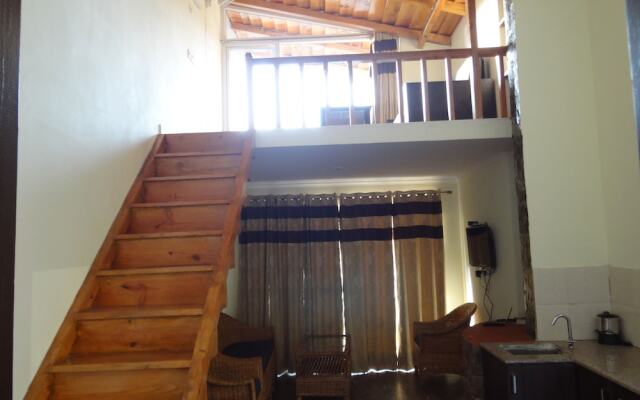 Luxury Suites overlooking lake at Naukuchiatal Nainital