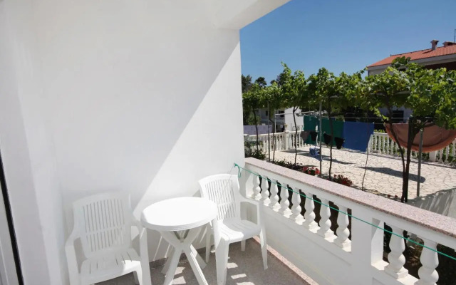 Apartments and rooms with parking space Palit, Rab - 5061