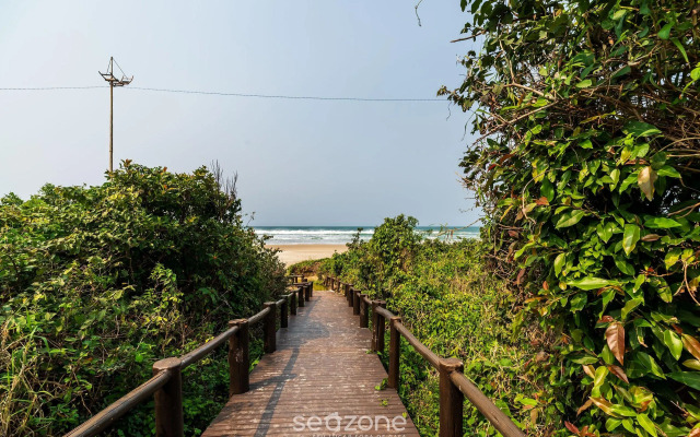 Apto beira mar com vista Praia do Santinho ASR204