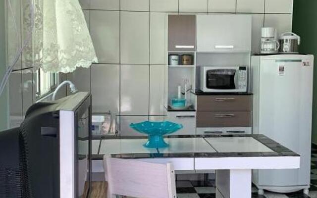 Casa, 1 quadra da praia.