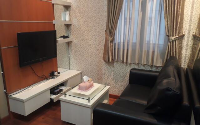 Apartment The Suites Metro by Herlan