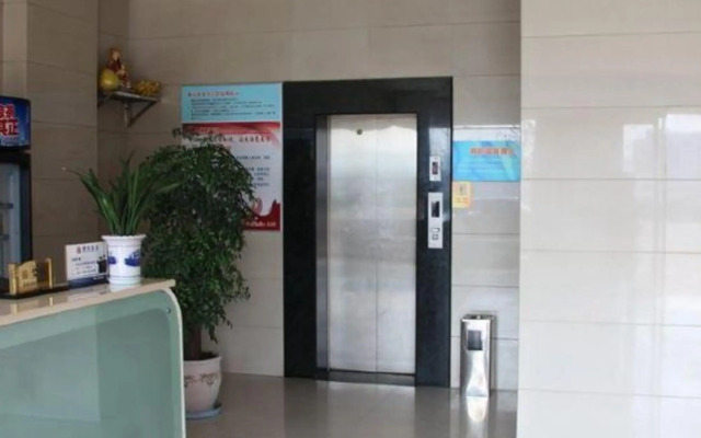 Paojiang Xinyuansu Business Hotel
