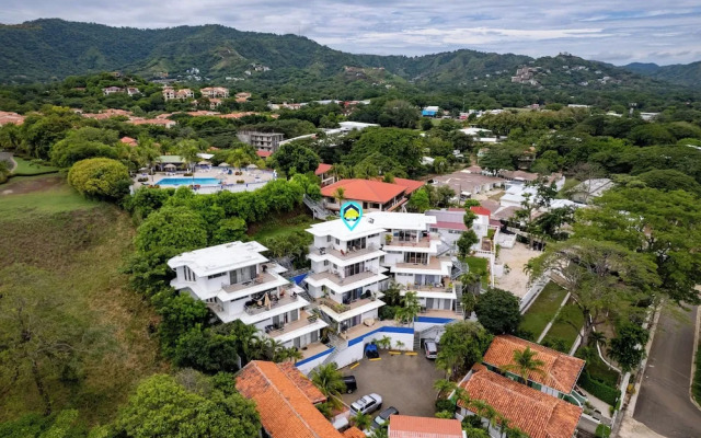 Modern Top-Floor Condo with Panoramic Views and Community Pool