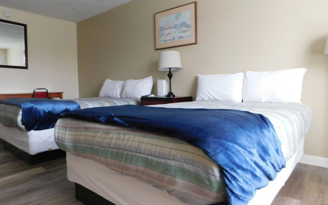 Apm Inn & Suites