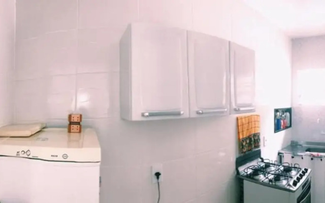 Suíte com cozinha no quintal da casa