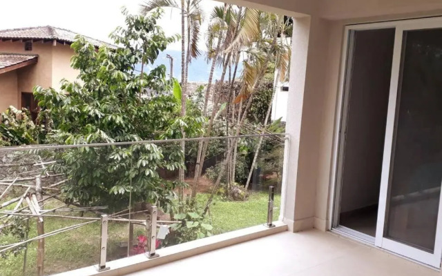 Casa com varanda, ar condicionado pet friendly